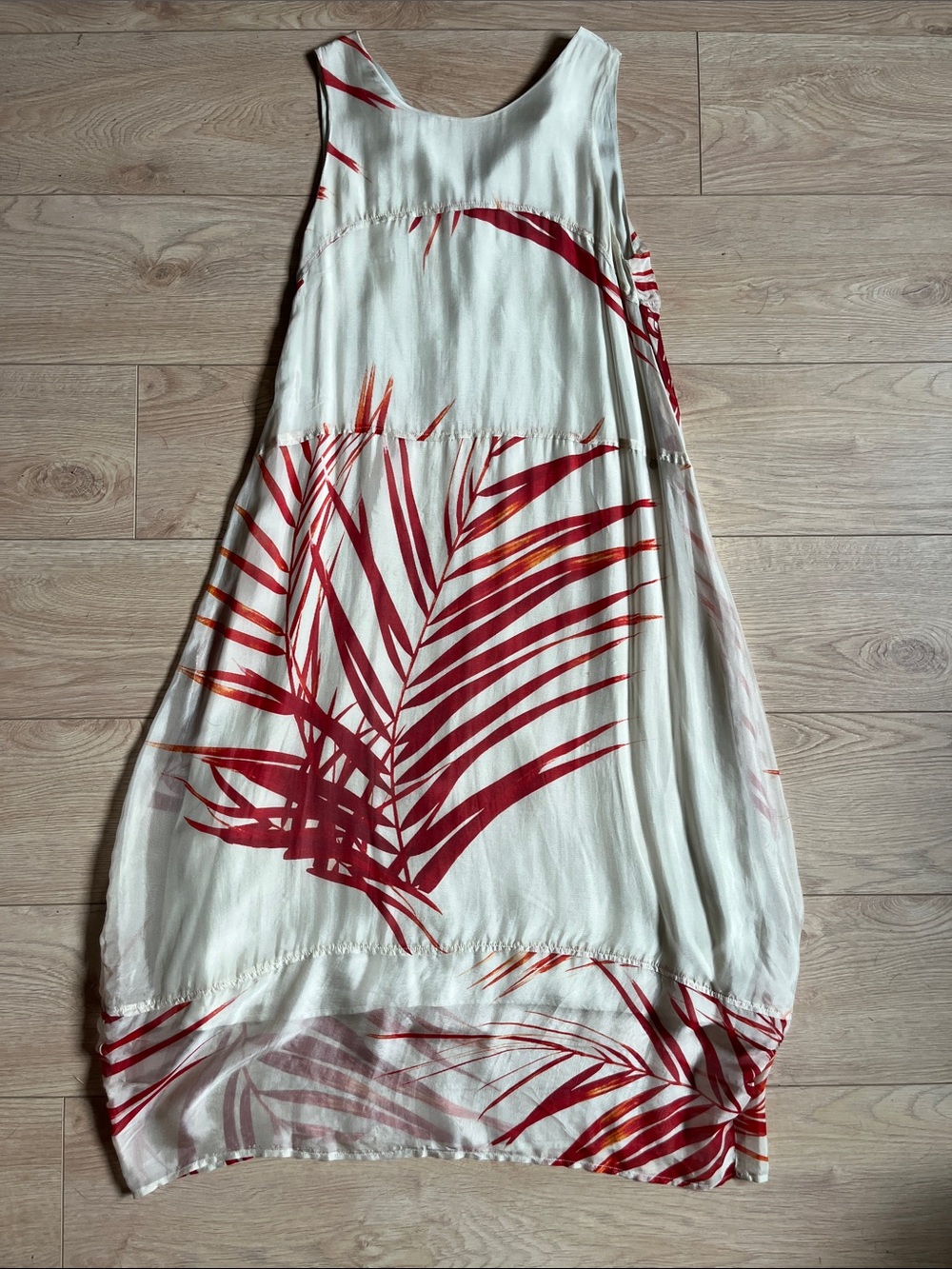 Sleeveless White Maxi Dress with Red Tropical Print